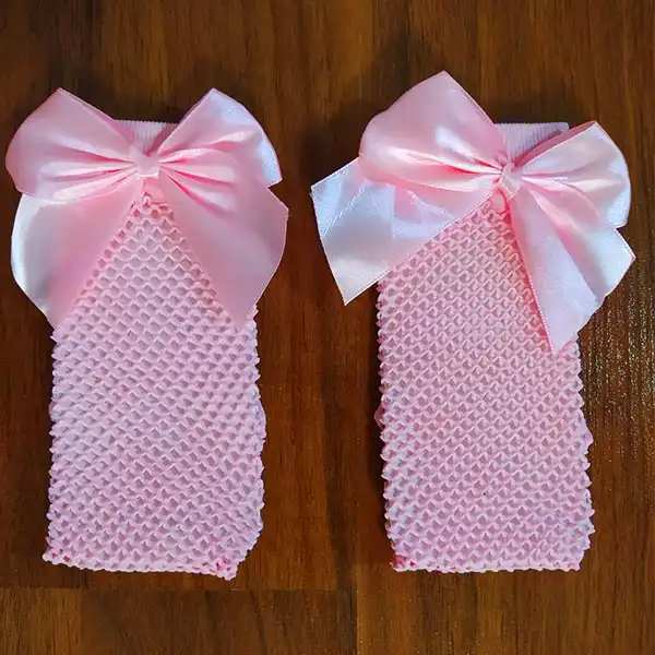 جوراب نوزادی مدل زنبوری رنگ صورتی