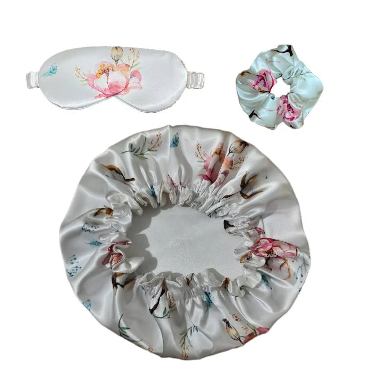 کلاه خواب زنانه مدل ساتن ابريشم طرح گل پنبه به همراه چشم بند و کش مو