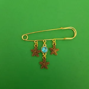 گل سینه زنانه مدل ستاره دریایی