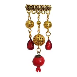 گل سینه زنانه مدل انار یلدا کد 11