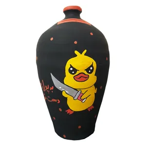 قلک سفالی طرح اردک چاقوکش کد 014