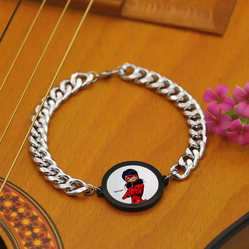 دستبند ناکسیگو مدل دختر کفشدوزکی کد BZ7151