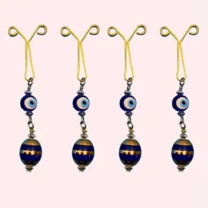 گیره روسری زنانه طرح چشم نظر کد 06 بسته 4 عددی