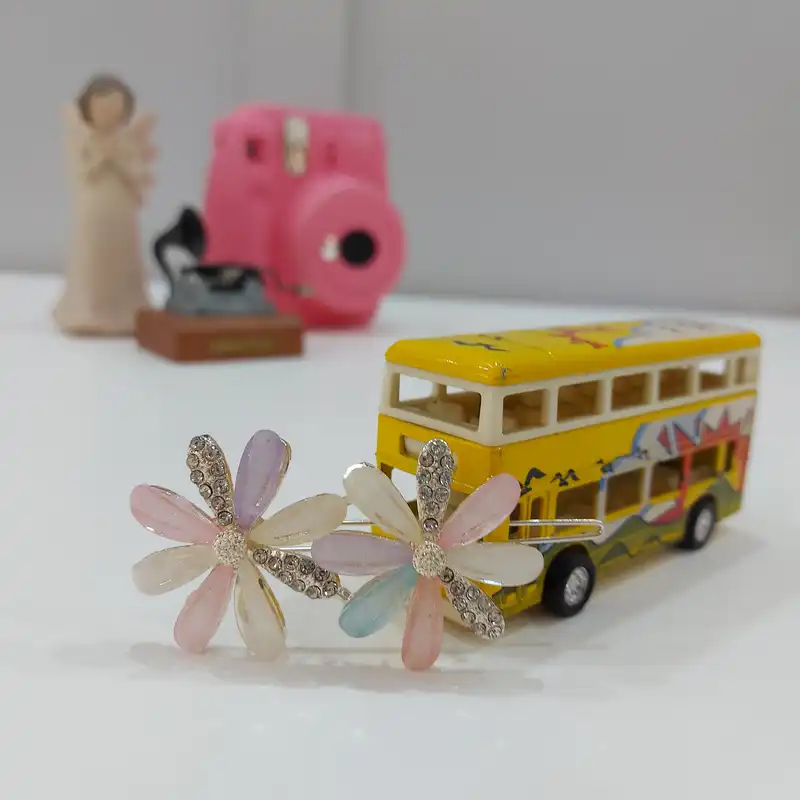 گیره مو زنانه مدل بابونه طرح گل