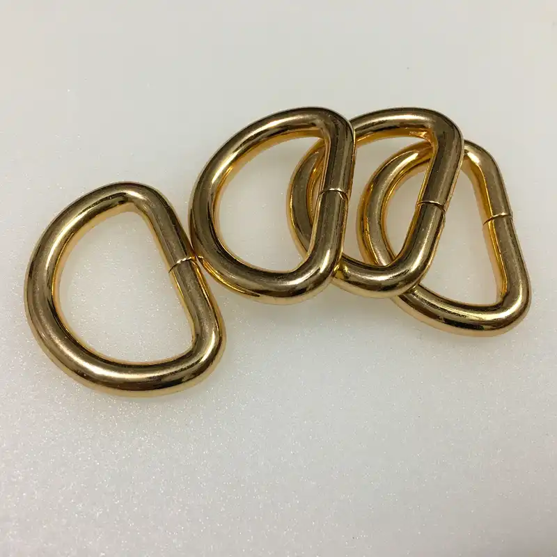 یراق کیف دوزی مدل نیم حلقه کد Y-2.5cmGld بسته 4 عددی