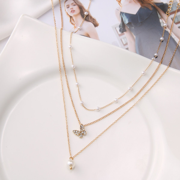 گردنبند دخترانه مدل مروارید و پروانه مجموعه سه عددی گردنبند دخترانه مدل مروارید و پروانه مجموعه سه عددی