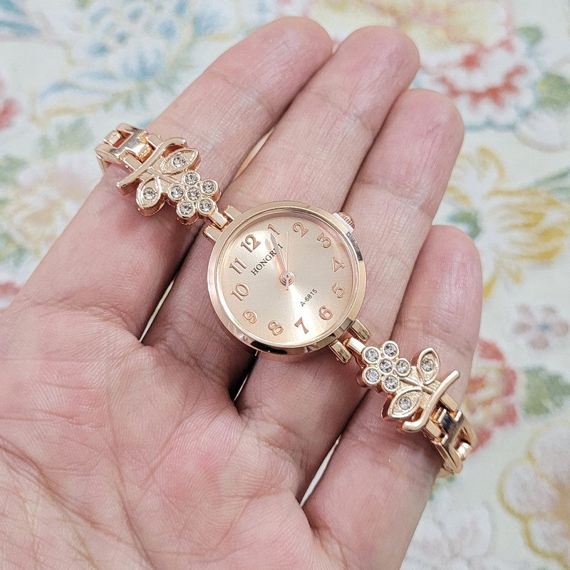 ساعت مچی عقربه ای دخترانه مدل شکوفه ساعت مچی عقربه ای دخترانه مدل شکوفه