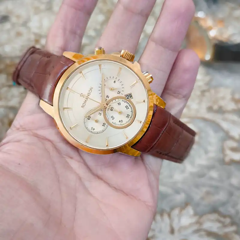 ست ساعت مچی عقربه ای زنانه و مردانه رومانسون مدل تک موتوره صفحه طرحدار بند چرم کد 2