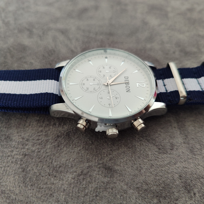 ساعت مچی عقربه‌ای مردانه مدل بند برزنتی کد 043