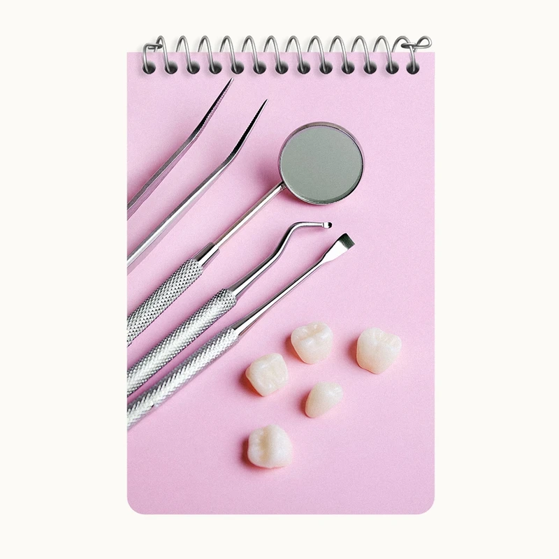 دفتر یادداشت 50 برگ خندالو طرح دندان و دندان پزشکی کد F9824