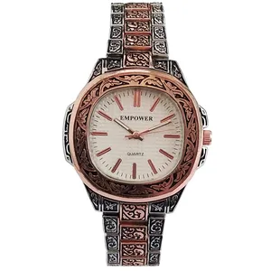 ساعت مچی عقربه ای زنانه مدل بندفلزی قلم زنی برجسته کد 250