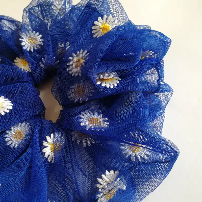 کش مو زنانه مدل گلدار بابونه