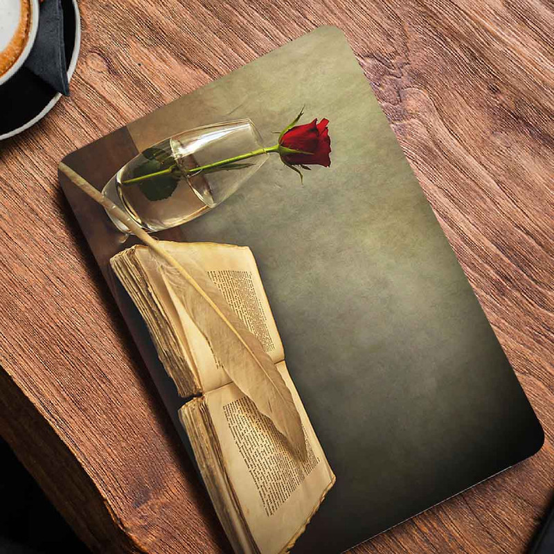 استیکر لپ تاپ طرح book old pen table vase rose reکد P-664 مناسب برای لپ تاپ 15.6 اینچ