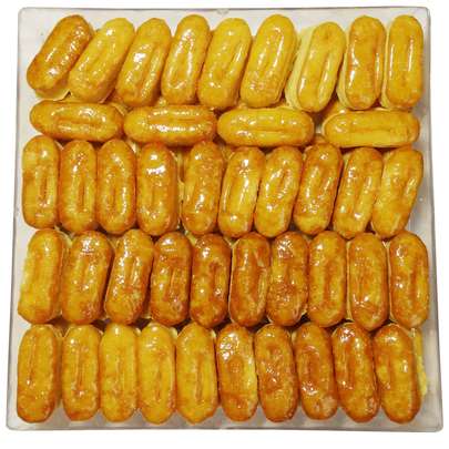 طرز تهیه شیرینی زبان با خمیر هزار لا در قنادی مدل نارگیلی و نازک با قیمت مناسب و ارزان