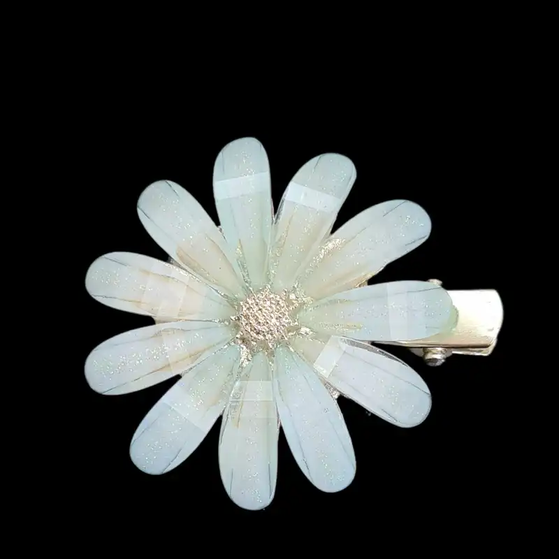 گیره مو زنانه مدل بابونه کریستالی پنسی کد B02