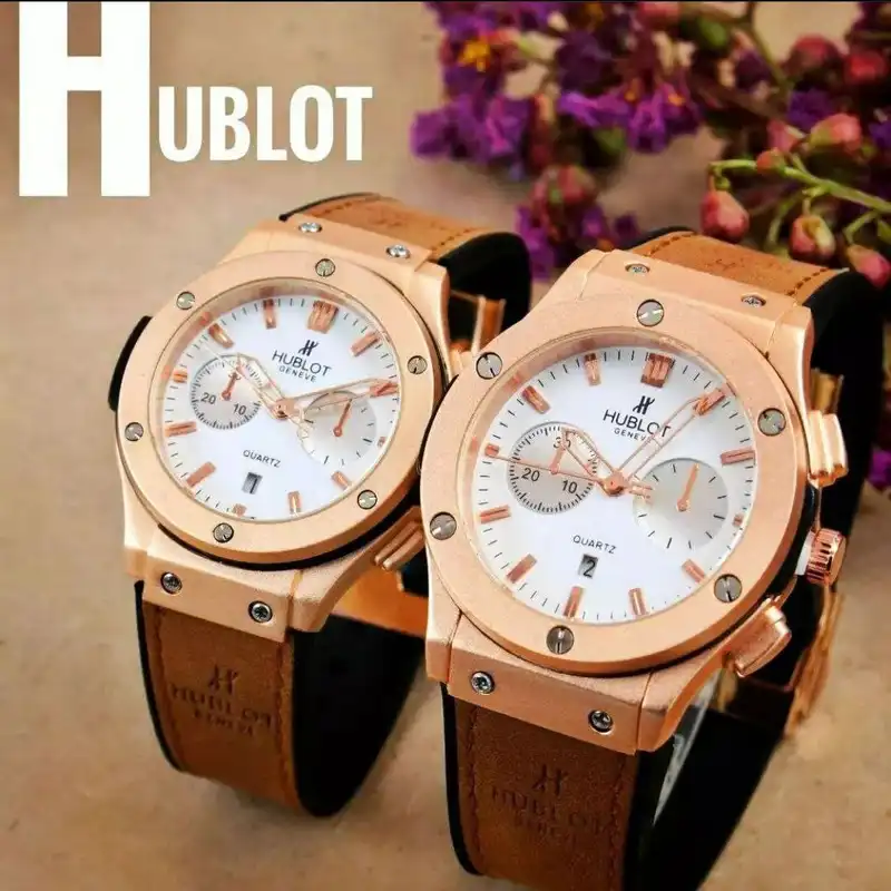 ست ساعت مچی عقربه ای زنانه و مردانه  مدل تک موتور Rs