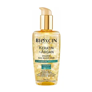 روغن آرگان تقویت کننده مو بیوکسین مدل Keratin مناسب برای انواع مو حجم 150 میلی‌لیتر