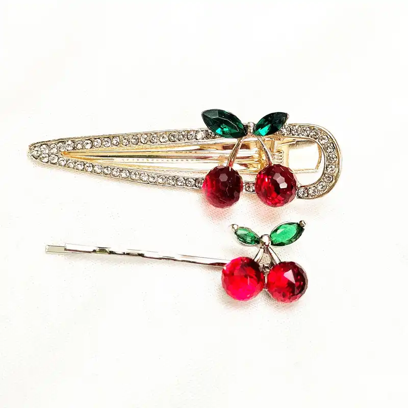 گیره مو زنانه مدل نگین دار مجلسی طرح گیلاس کد brg 1870 بسته 2 عددی