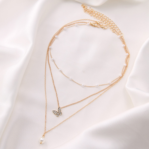 گردنبند دخترانه مدل مروارید و پروانه مجموعه سه عددی گردنبند دخترانه مدل مروارید و پروانه مجموعه سه عددی