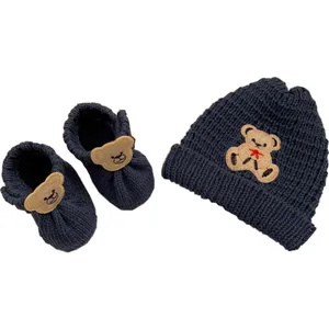 ست کلاه و پاپوش بافتنی نوزادی مدل کشبافت