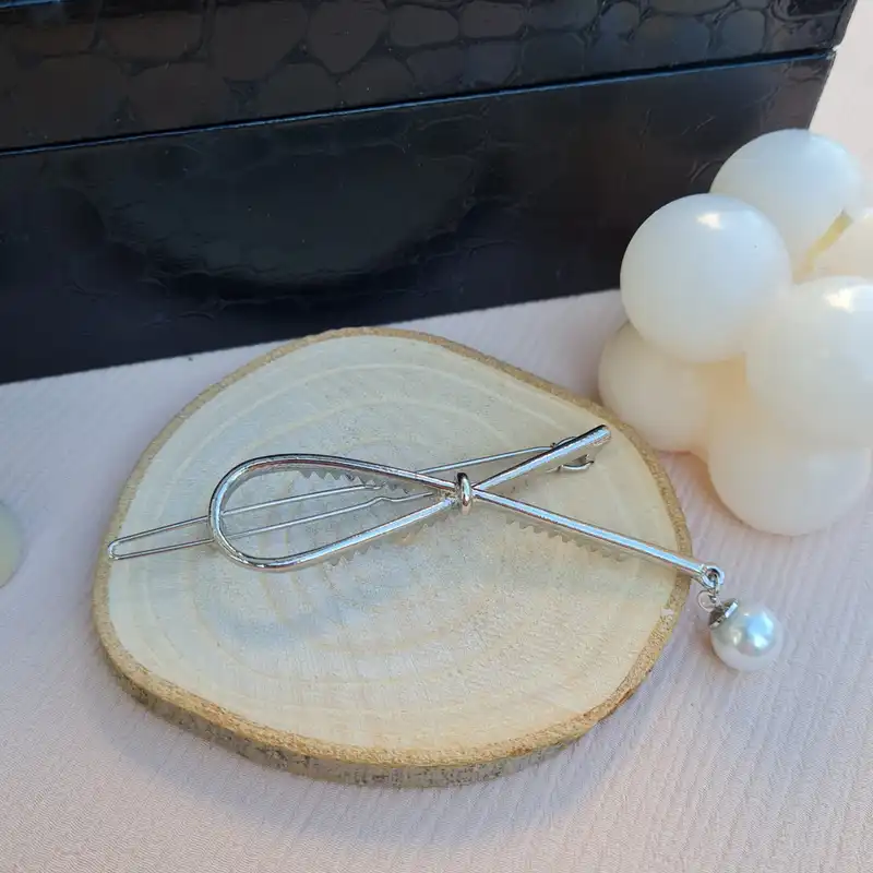 گیره مو زنانه مدل پاپیون مرواریدی