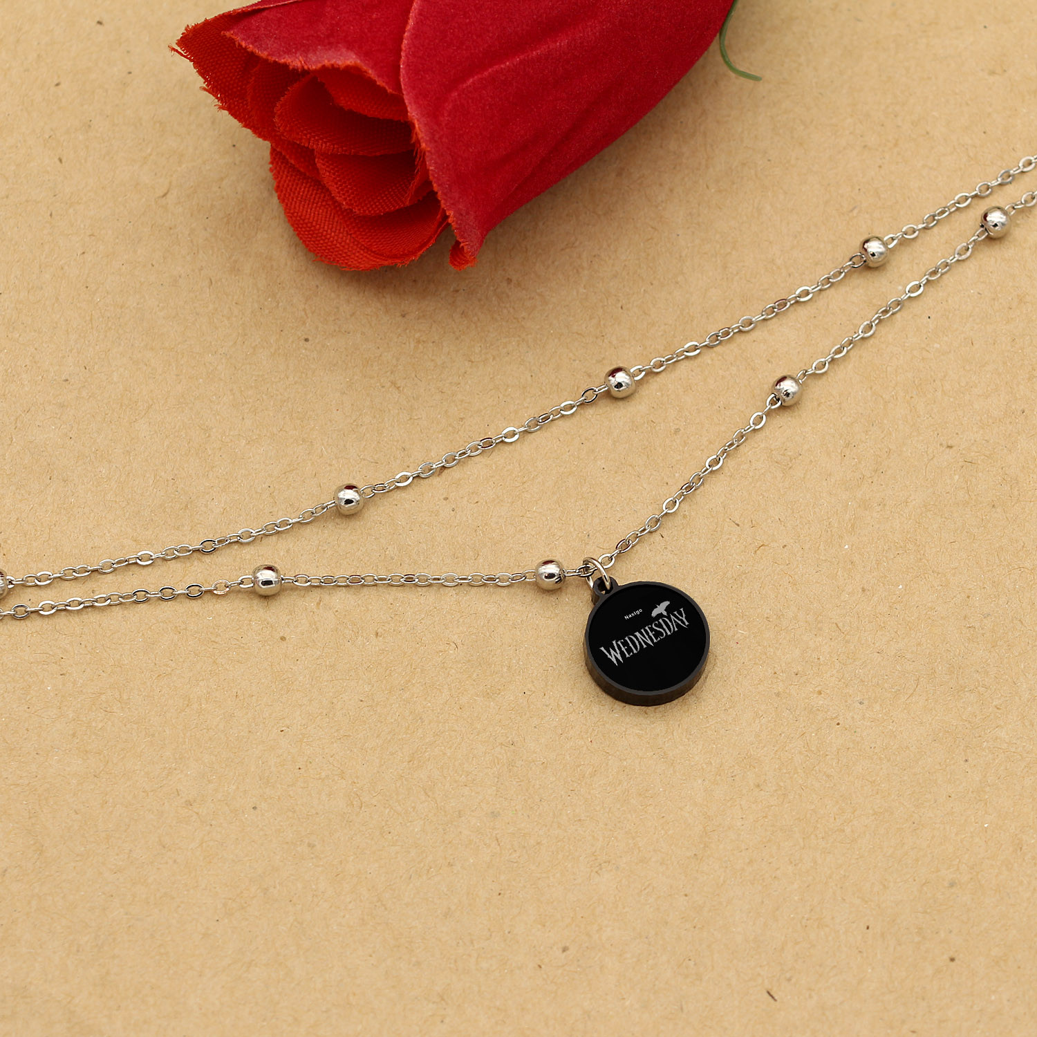 پابند زنانه ناکسیگو مدل شب تاب طرح Wednesday کد LB7389 پابند زنانه ناکسیگو مدل شب تاب طرح Wednesday کد LB7389