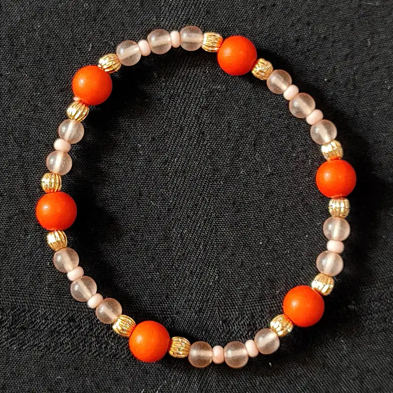 دستبند زنانه اکسسورایز مدل کشی مهره ای بسته سه عددی