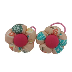 کش مو دخترانه مدل فانتزی طرح گل پارچه ای مجموعه 2 عددی