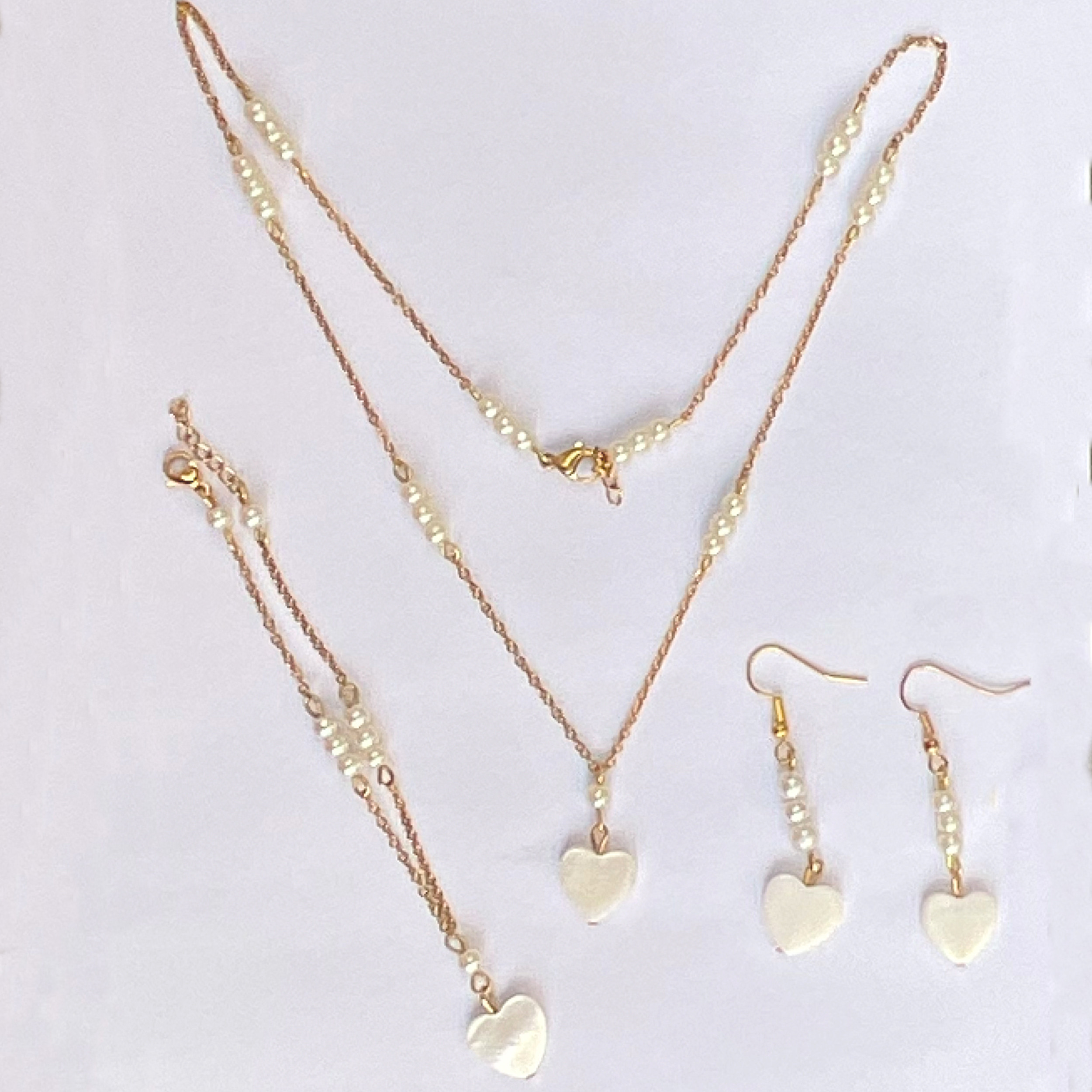 نیم ست زنانه مدل صدف و مروارید