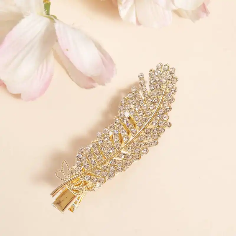 گیره مو زنانه مدل پَر نگین دار پنسی کد 973 brg