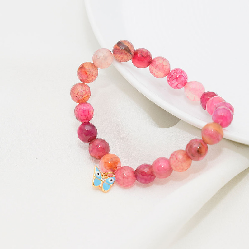 دستبند زنانه دلنار گالری مدل سنگ جید و پروانه چشم نظر