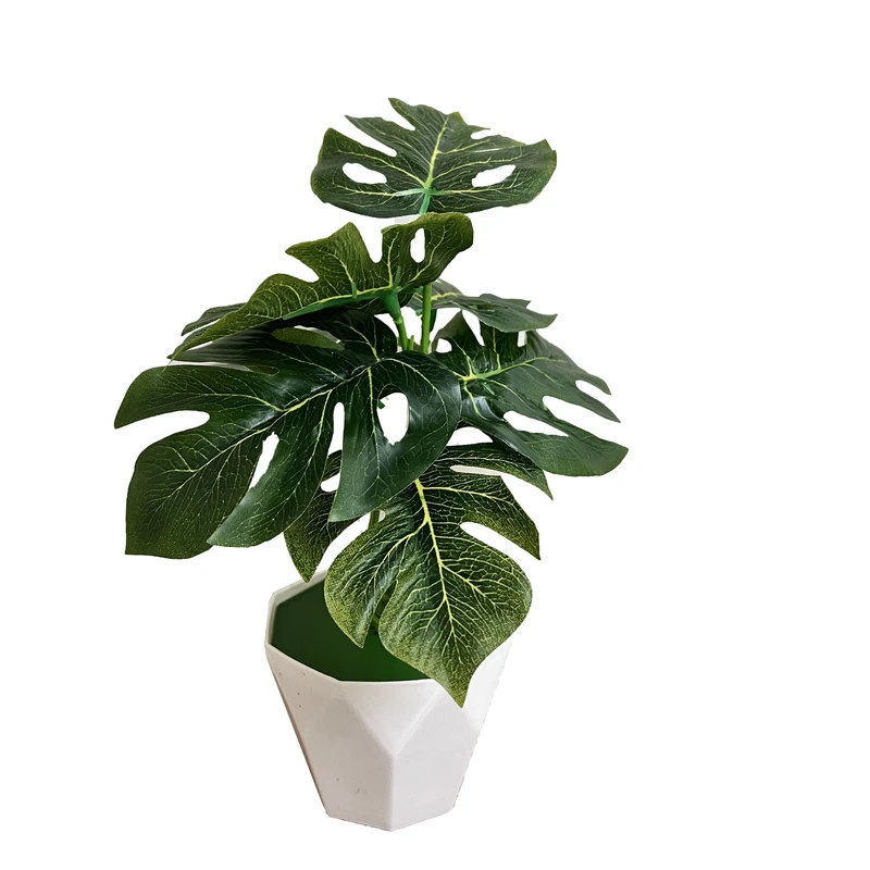 گلدان به همراه گل مصنوعی مدل برگ انجیری الماسی