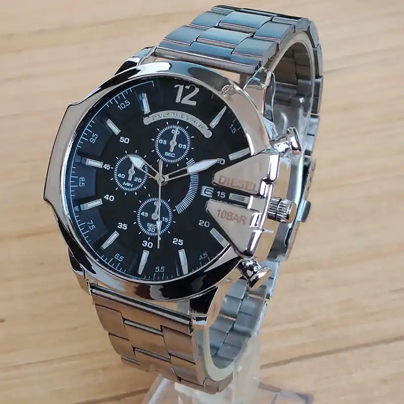 ساعت مچی عقربه‌ای مردانه مدل بند فلزی شاخدار کد 25 NGH