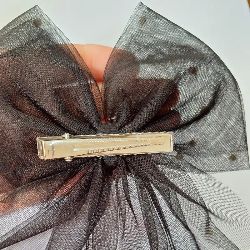 گیره مو زنانه مدل پاپیون مروارید دار