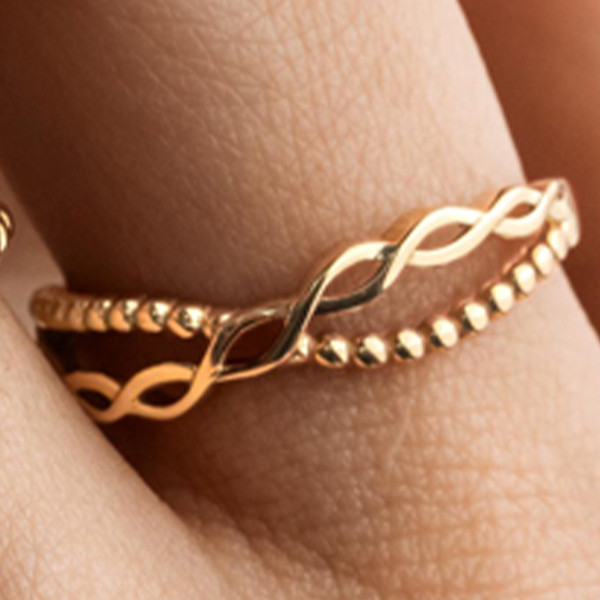 انگشتر طلا 18 عیار زنانه ماوی گالری مدل بافت و گوارسه