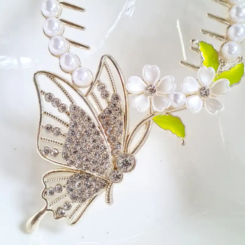 گیره مو زنانه مدل گوجه‌ای پروانه نگین‌دار آبشاری کد brg 680