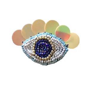 گل سینه زنانه مدل چشم نظر