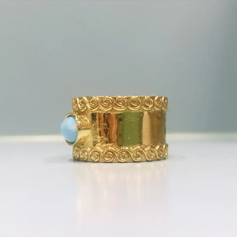 انگشتر نقره زنانه مدل دستساز طرح پنبه ای با فیروزه عجمی نیشابوری