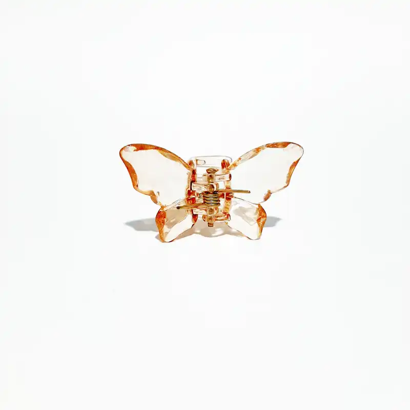 کلیپس مو زنانه مدل پروانه کریستالی طرح شیشه ای