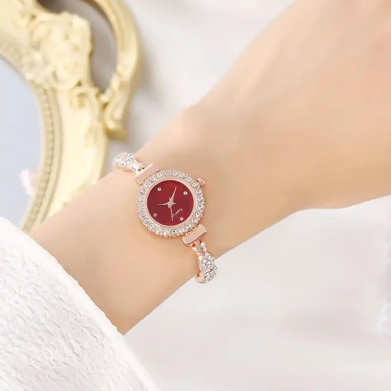 ساعت مچی عقربه ای زنانه مدل بند نگین دار دور نگین قفل کرواتی 1