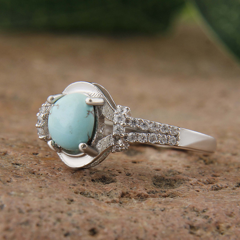 انگشتر نقره زنانه بازرگانی میلادی مدل سنگ فیروزه طبیعی نگین برلیان بدون ریزش آبکاری رادیوم کد AWR_1598