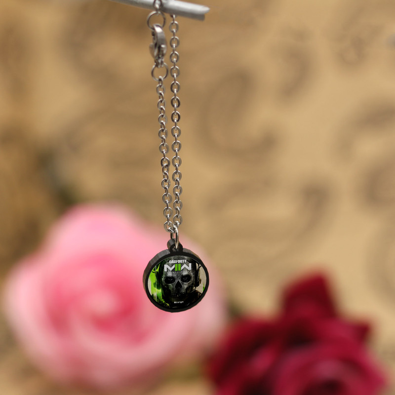 آویز ساعت زنانه ناکسیگو مدل شب تاب طرح Call of Duty کد AW7266 آویز ساعت زنانه ناکسیگو مدل شب تاب طرح Call of Duty کد AW7266