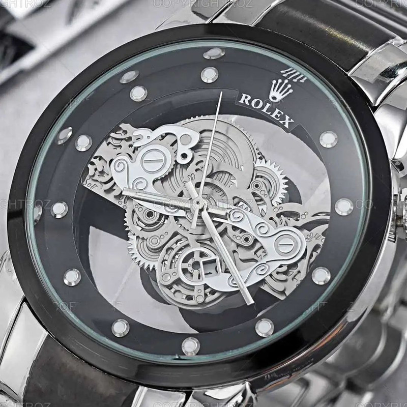 ساعت مچی عقربه‌ای مردانه  مدل پشت شیشه ای موتور پیدا قفل مخفی M_silvr