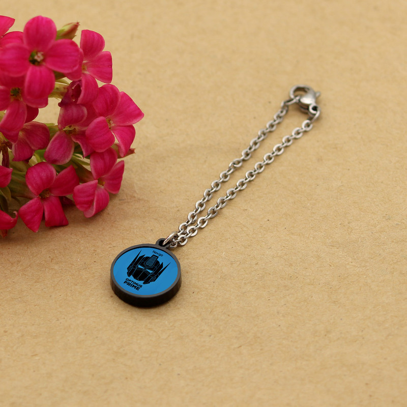 آویز ساعت زنانه ناکسیگو مدل شب تاب طرح اپتیموس پرایم کد AW8894