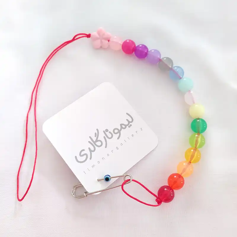 بند پستانک لیمونار گالری مدل گل رنگارنگ و چشم نظر