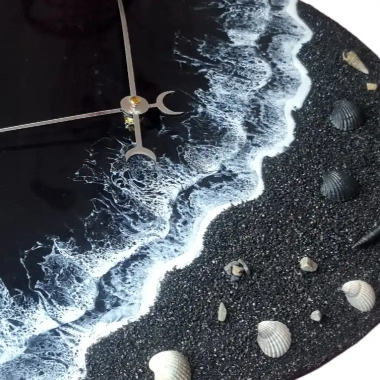 ساعت دیواری رزینی طرح دریای شب