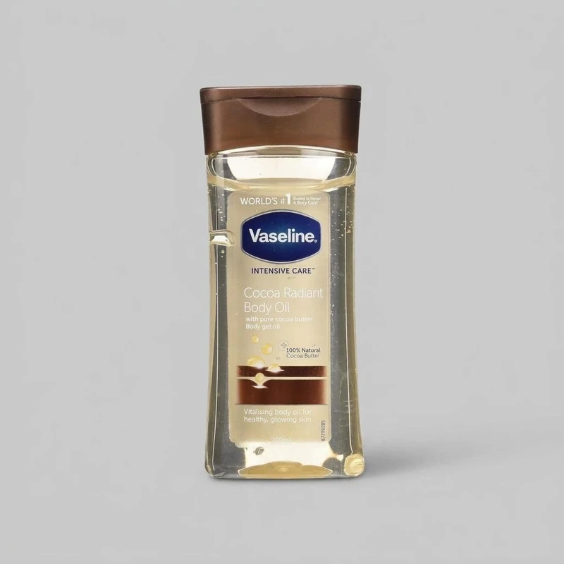 روغن بدن وازلین مدل Cocoa Butter حجم 200 میلی‌لیتر حاوی کره کاکائو خالص، ترمیم‌کننده پوست خشک و حساس، جذب سریع، حفظ رطوبت و ایجاد حس بدون چربی