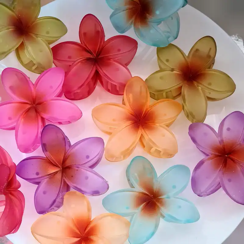 کلیپس مو زنانه مدل گل پنچ پر استوایی شفاف کد PL360