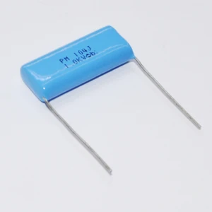خازن پلی استر تایتسو مدل PM104J-1.0KV بسته 50 عددی