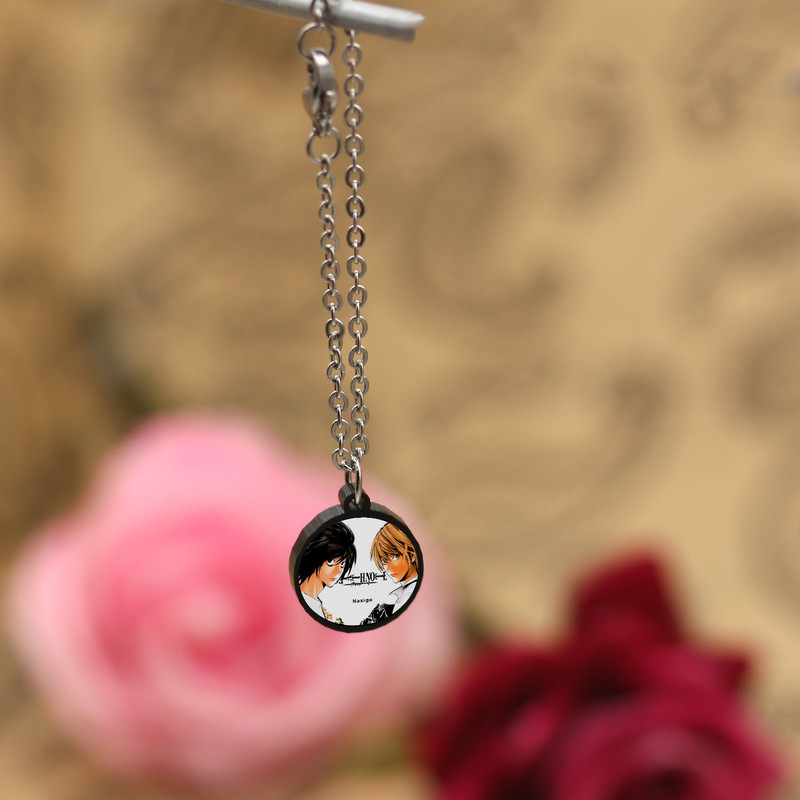 آویز ساعت زنانه ناکسیگو مدل شب تاب طرح Death Note کد AW9045 آویز ساعت زنانه ناکسیگو مدل شب تاب طرح Death Note کد AW9045